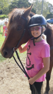 Katie enjoying horse-riding